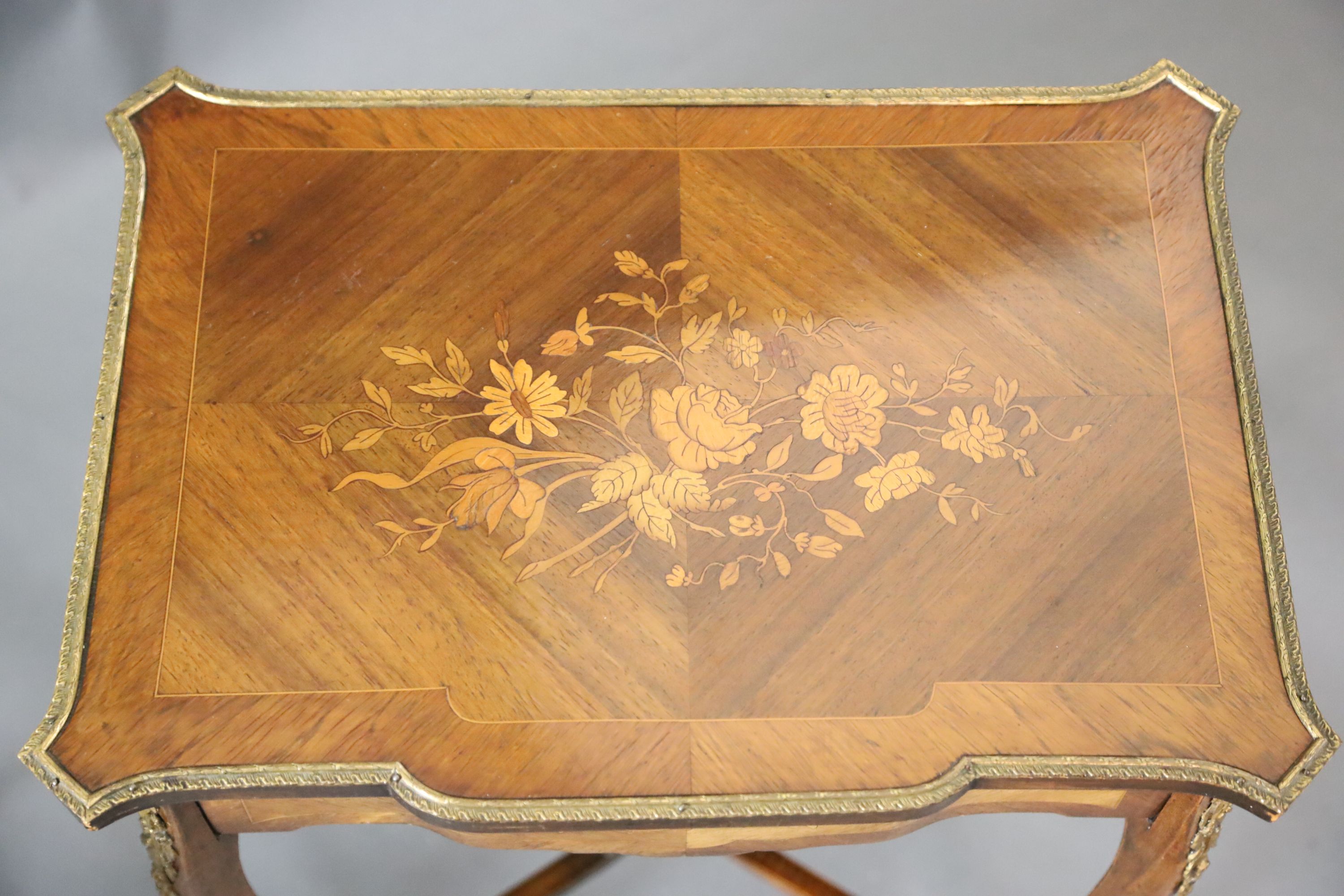 A pair of Louis XVI style ormolu mounted marquetry work tables, W.1ft 9in. D.1ft 3in. H.2ft 6in.
